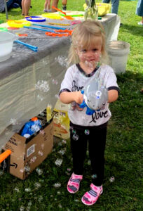 Girl with bubbles at Art Fest